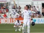 Graeme Swann celebrates his fifty during their International warm up match against Essex on June 30, 2013