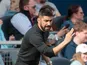 Houston Dynamo head coach Paulo Nagamura speaks to Houston Dynamo defender Adam Lundqvist (3) along the sidelines during the first half against the Sporting Kansas City at Children's Mercy Park on March 5, 2022