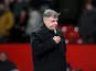 West Ham manager Sam Allardyce leaves the field at the final whistle after losing against Manchester United during the FA Cup third round replay on January 16, 2013