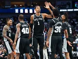 San Antonio Spurs forward Victor Wembanyama celebrates with teammates