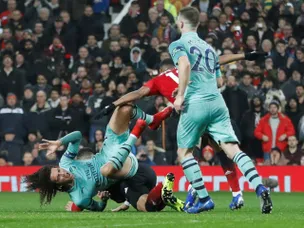 Man United fight back to draw with Arsenal