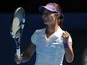 China's Li Na celebrates after defeating Maria Sharapova in the semifinal of the Australian Open tennis championship on January 24, 2013
