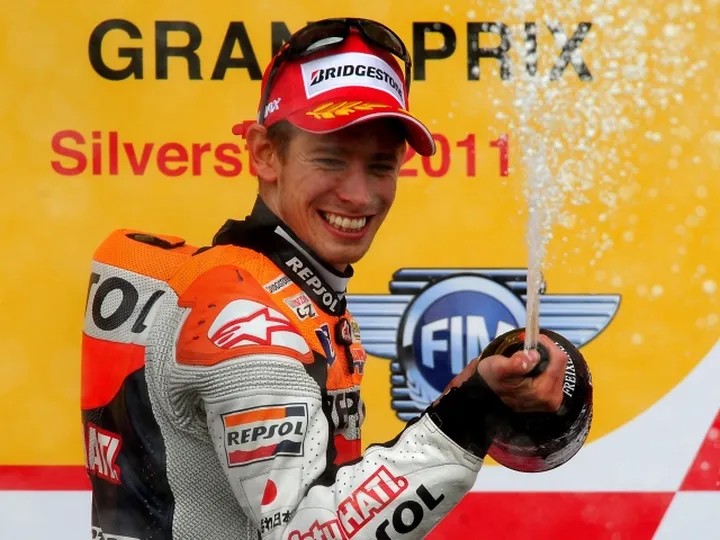 Stoner claims pole in Australia