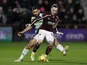 Hearts' Barrie McKay in action with Celtic's Cameron Carter-Vickers on January 26, 2022
