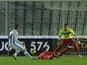 Pescara's Mervan Celik scores the opening goal against Catania on December 21, 2012