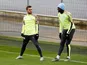 Manchester City's Bernardo Silva and Benjamin Mendy during training in November 2019