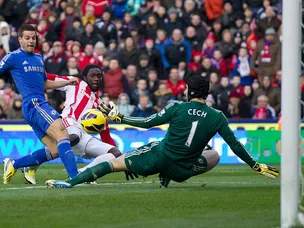 Walters own goal gifts Chelsea lead