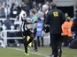 Papiss Cisse celebrates with manager Alan Pardew after grabbing the winner against Fulham on April 7, 2013
