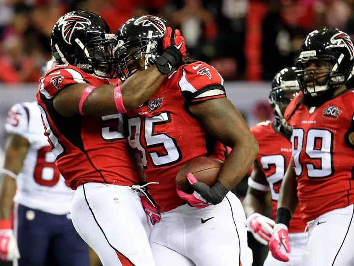 Falcons score seven TDs in Texans rout