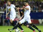 Sevilla's Alberto Botia closes down Barcelona's Lionel Messi on September 29, 2012