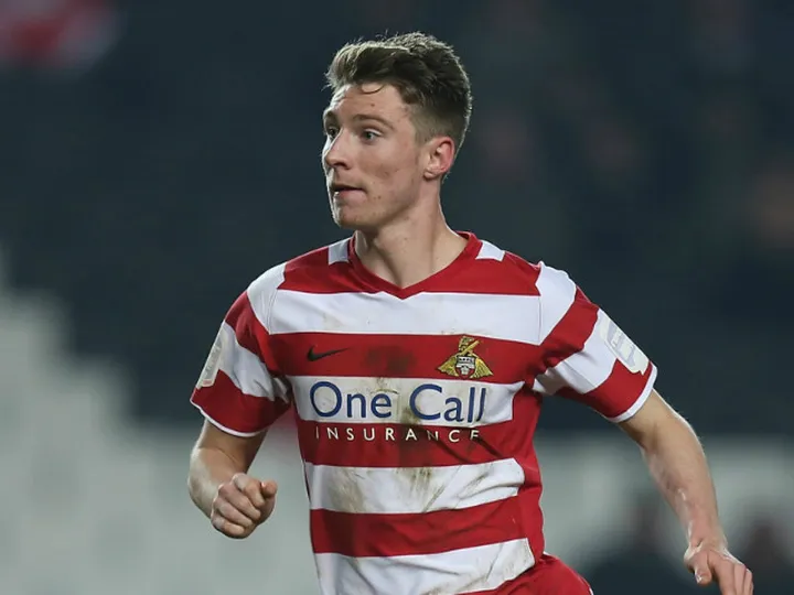 James Husband extends Huddersfield loan