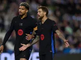 Barcelona's Inigo Martinez with Ronald Araujo on April 12, 2025