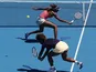The Williams sisters in action at the Australian Open tennis championship on January 22, 2013