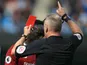 Jon Moss hands Sadio Mane a red card during the Premier League game between Manchester City and Liverpool on September 9, 2017