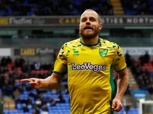 Managers team up to toast two-goal Teemu after Norwich go top