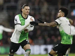 Liverpool thump Bournemouth to open up five-point lead at summit