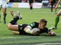 Huddersfield's Larne Patrick scores a try during the Super League against Widnes Vikings on May 17, 2013