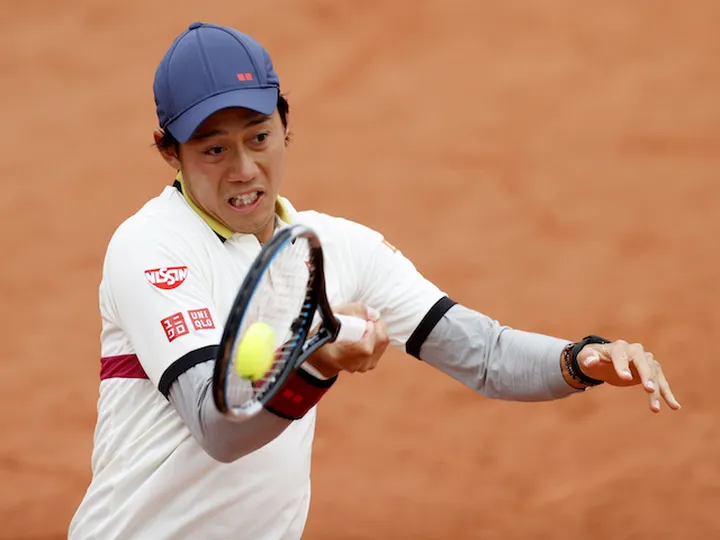 Dan Evans knocked out of French Open by Kei Nishikori in five sets