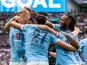 Manchester City's Antoine Semenyo celebrates with Erling Haaland and teammates on May 16, 2026