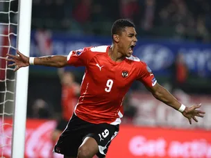 Austria overcome rivals Russia