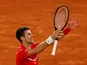 Novak Djokovic celebrates after beating Stefanos Tsitsipas to reach the French Open final on October 9, 2020