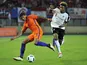 Austria's David Alaba (R) and Patrick van Aanholt of the Netherlands vie during the EURO 2016 friendly football match Austria vs Netherlands at Ernst Happel stadium in Vienna, Austria, on June 4, 2016