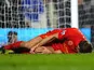 Steven Gerrard lies injured