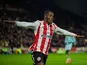 Dango Ouattara of Brentford celebrates scoring against Burnley, on November 29, 2025