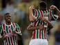 Fluminense players celebrate a goal on April 11, 2018