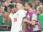 England's Jarell Quansah is consoled by Jordan Henderson and Dean Henderson on July 9, 2026