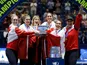 Canada celebrate on the podium with the trophy after winning the Billie Jean King Cup on November 12, 2023