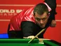 Mark Allen of Northern Ireland looks on during his match against Michael Holt of England during day four of the The Dafabet World Snooker Championship on April 22, 2014