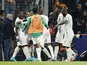 Ivory Coast's Nicolas Pepe celebrates scoring their first goal with teammates on March 25, 2022