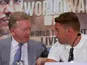 Frank Warren chats to Billy Joe Saunders during a press conference on August 17, 2015
