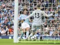 Leroy Sane scores past Wayne Hennessey during the Premier League game between Manchester City and Crystal Palace on September 23, 2017