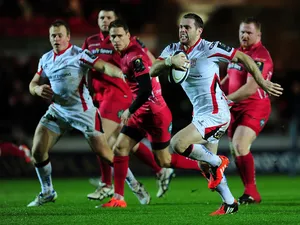 Darren Cave of Ulster breaks through to go over for his side's first try during the European Rugby Champions Cup match between Scarlets and Ulster Rugby at Parc y Scarlets on December 14, 2014 
