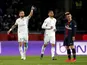 Strasbourg's Anthony Goncalves celebrates scoring their second goal as Paris St Germain's Marco Verratti looks dejected on April 7, 2019