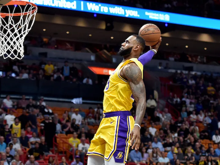 LeBron feels love on Cleveland return, but shows no mercy in Lakers win