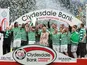Celtic players celebrate with the SPL trophy on May 11, 2013