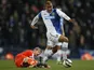 Blackburn Rovers Joshua King gets away from Millwall's Andrew Keogh during the FA Cup Quarter Final Replay on March 13, 2013