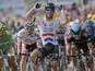 Britain's Marc Cavendish crosses the finish line to win the fifth stage of the Tour de France on July 3, 2013