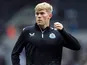 Newcastle United's Lewis Hall during the warm up before the match on September 16, 2023 
