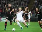 Tottenham Hotspur's Eric Dier slides in for a challenge on Admir Mehmedi of Bayer Leverkusen during the Champions League Group E clash at Wembley Stadium on November 2, 2016
