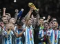Argentina players lift the World Cup 2022 trophy on December 18, 2022