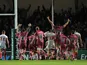 Exeter Chiefs' players celebrate as team mate James Scaysbrook scores a try in the dying moments of the match on December 15, 2012