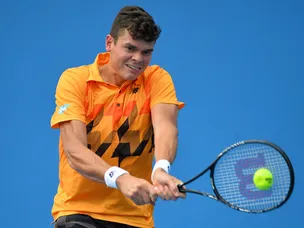 Raonic books third-round spot
