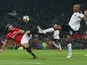 Juan Mata and Andre Wisdom in action during the FA Cup game between Manchester United and Derby County on January 5, 2018