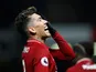 Liverpool's Roberto Firmino celebrates after scoring during his side's Premier League clash with Watford on November 24, 2018