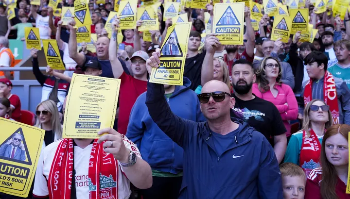 Liverpool "exploited by Yanks" as Anfield fans launch mass protest against ticket price increase