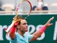 French Open day four: Serena Williams withdraws as Rafael Nadal breezes through